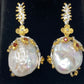 Genuine Baroque Pearl Earrings accented with Garnets