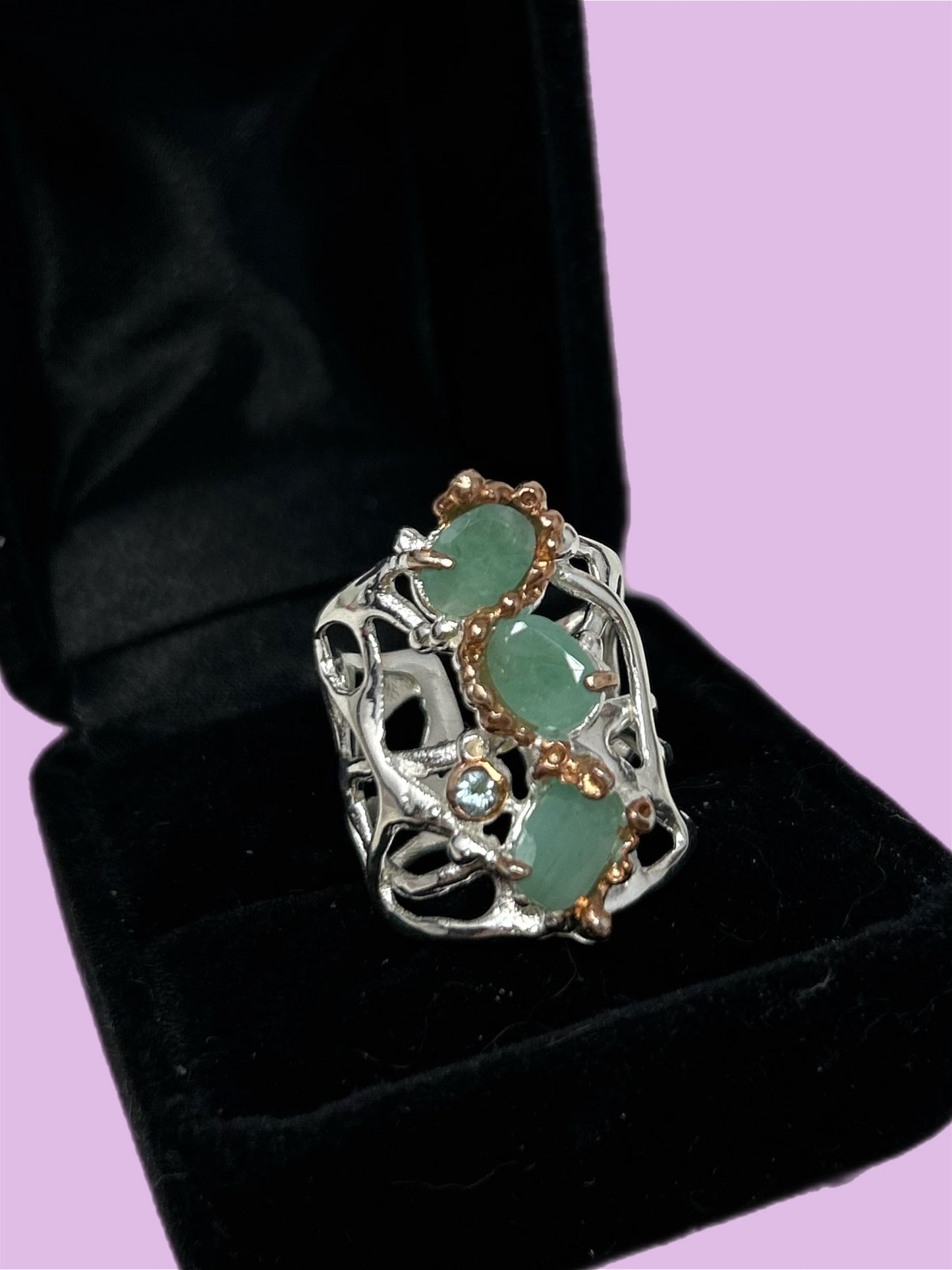 Genuine Emeralds, in a enchanting, custom made setting.