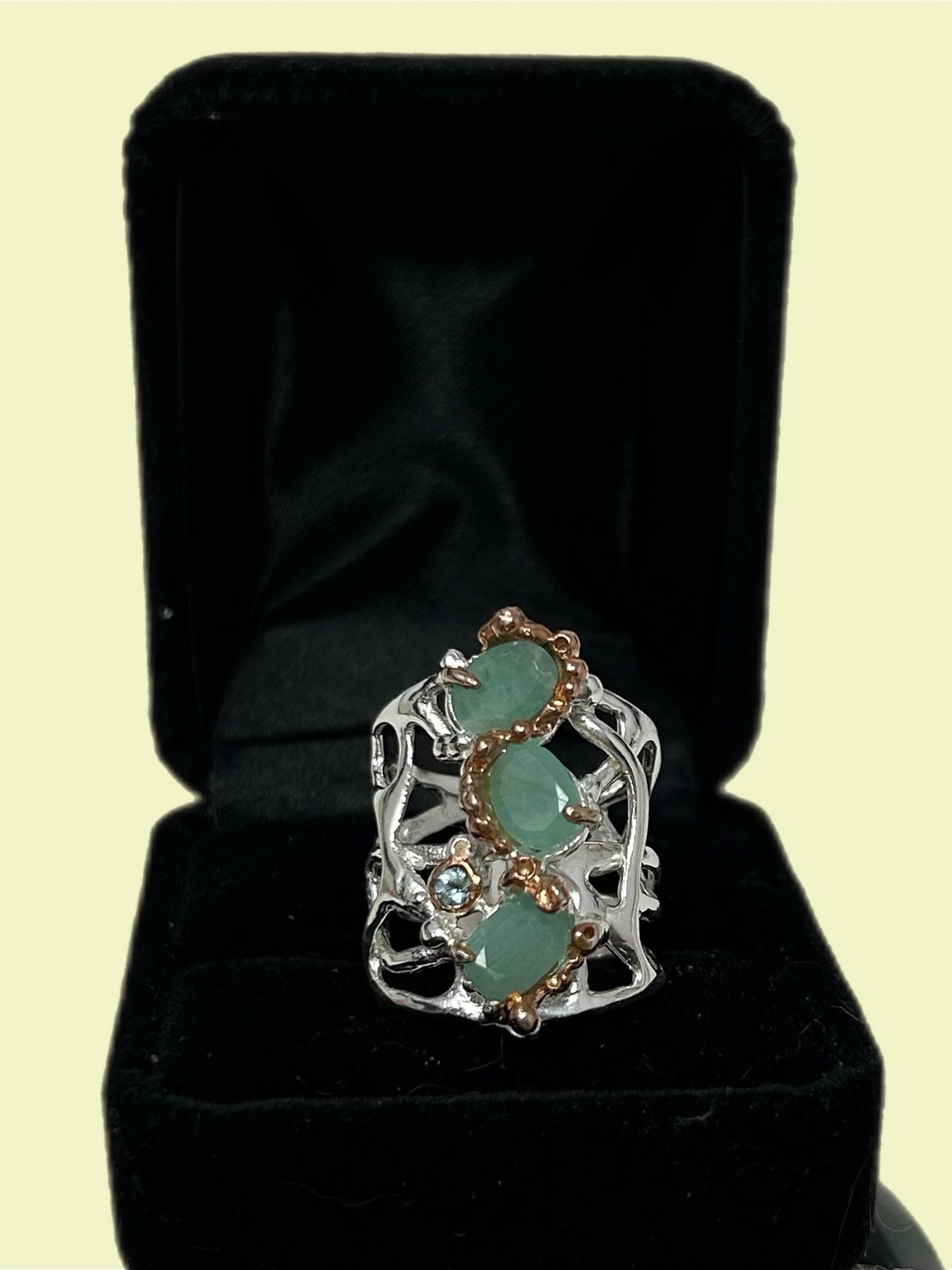 Genuine Emeralds, in a enchanting, custom made setting.