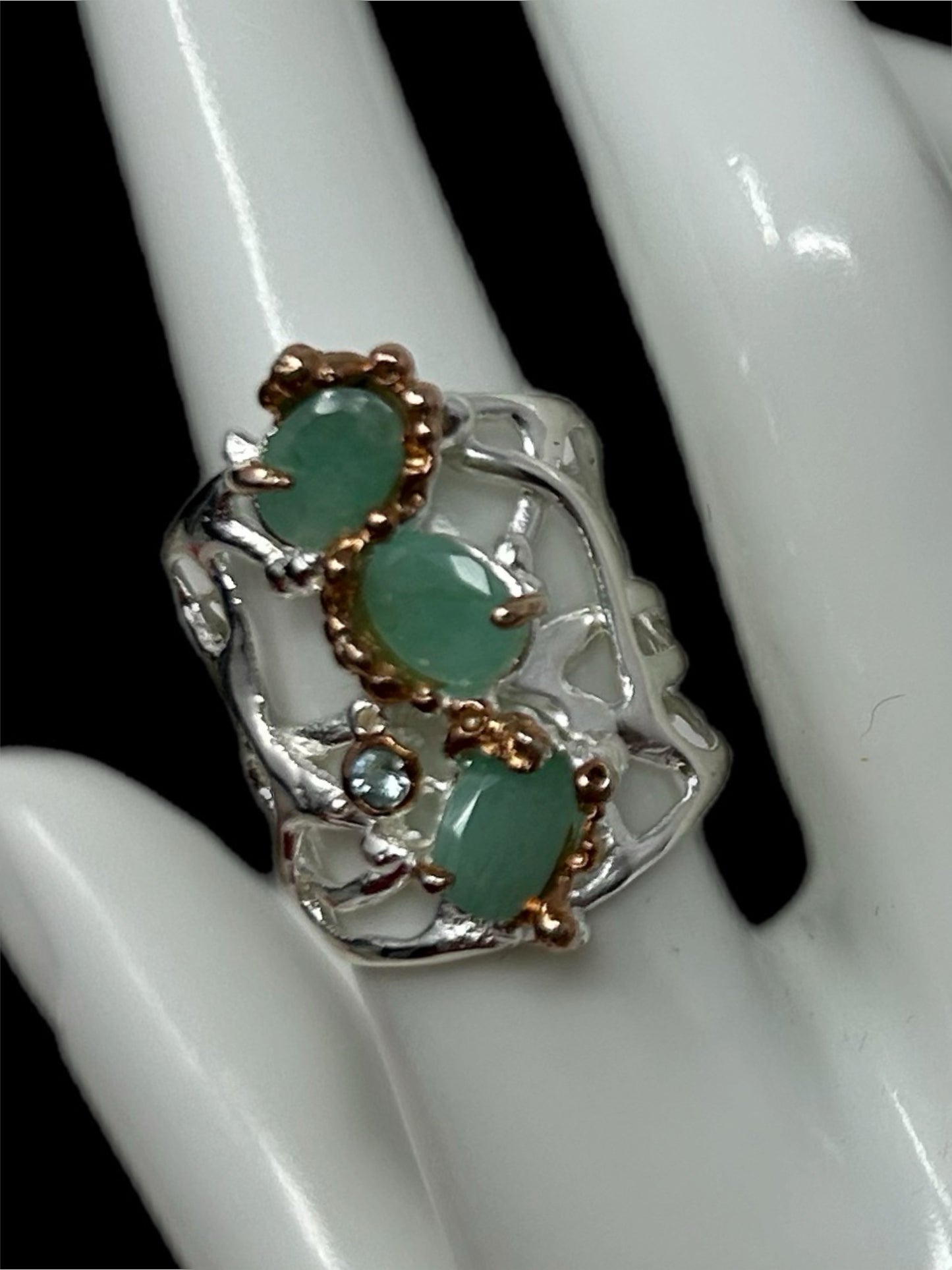 Genuine Emeralds, in a enchanting, custom made setting.