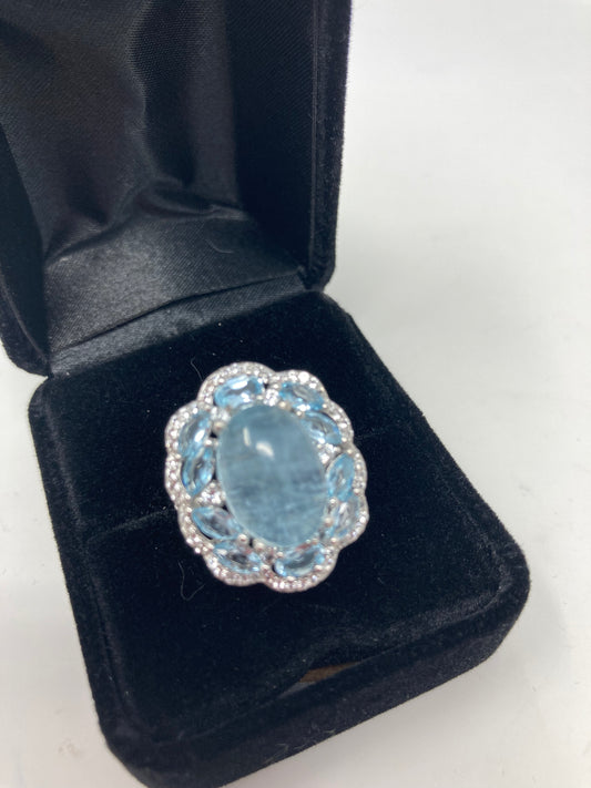 Rare 14mm by 10mm genuine Aquamarine Cabochon encrusted with Marquee shaped faceted Aquamarines