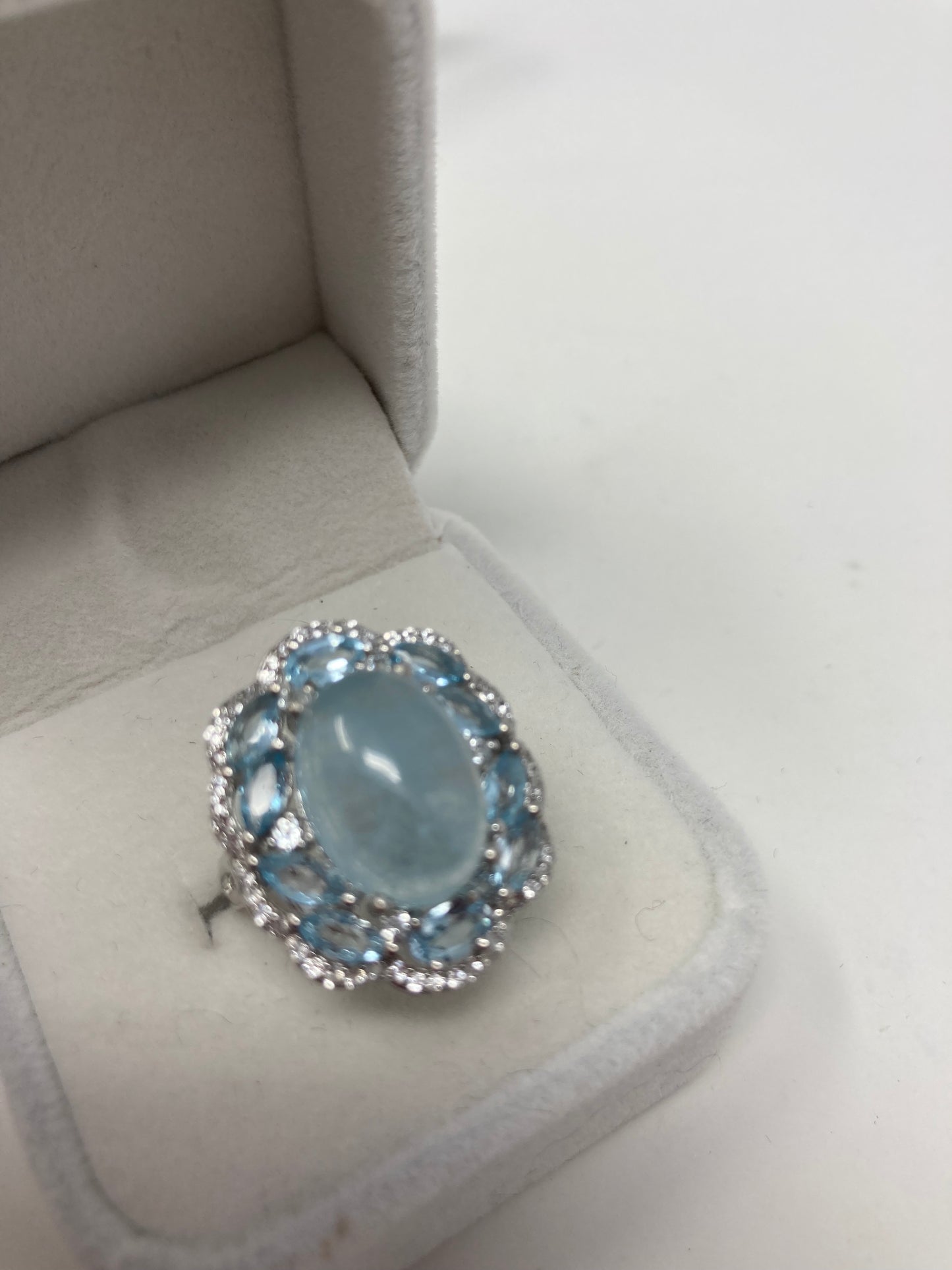 Rare 14mm by 10mm genuine Aquamarine Cabochon encrusted with Marquee shaped faceted Aquamarines