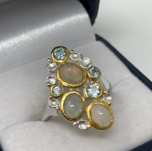 Genuine Opals & Blue Topaz Ring