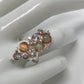 Genuine Opals and Blue Topaz Ring