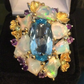 Over The Top Genuine Blue Topaz and Opal Ring