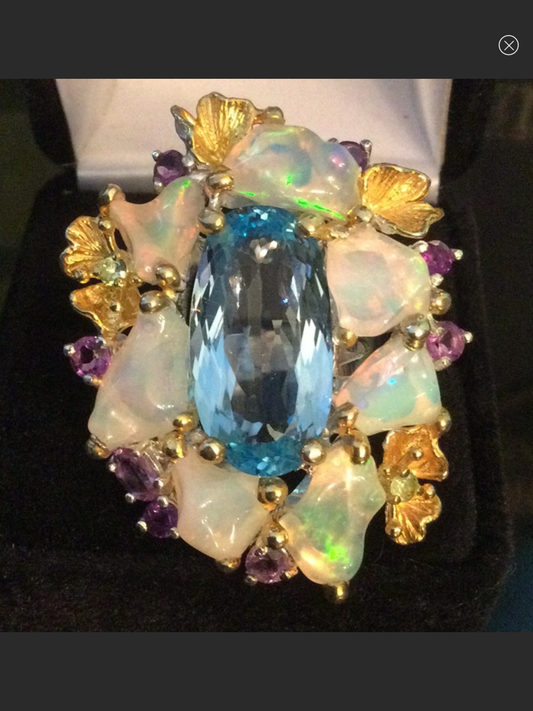 Over The Top Genuine Blue Topaz and Opal Ring