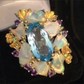 Over The Top Genuine Blue Topaz and Opal Ring