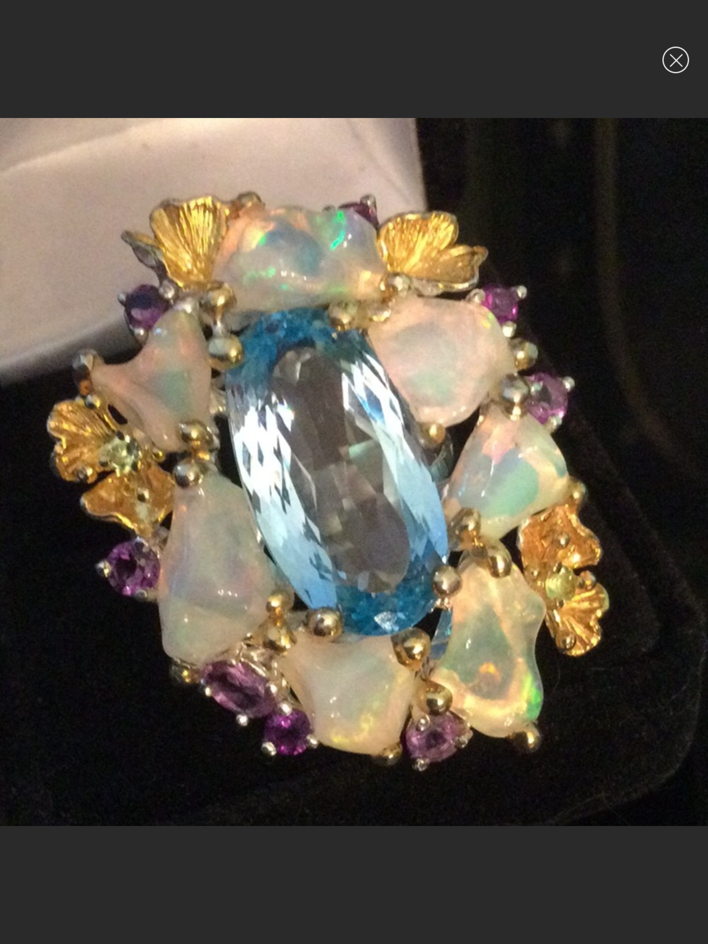 Over The Top Genuine Blue Topaz and Opal Ring