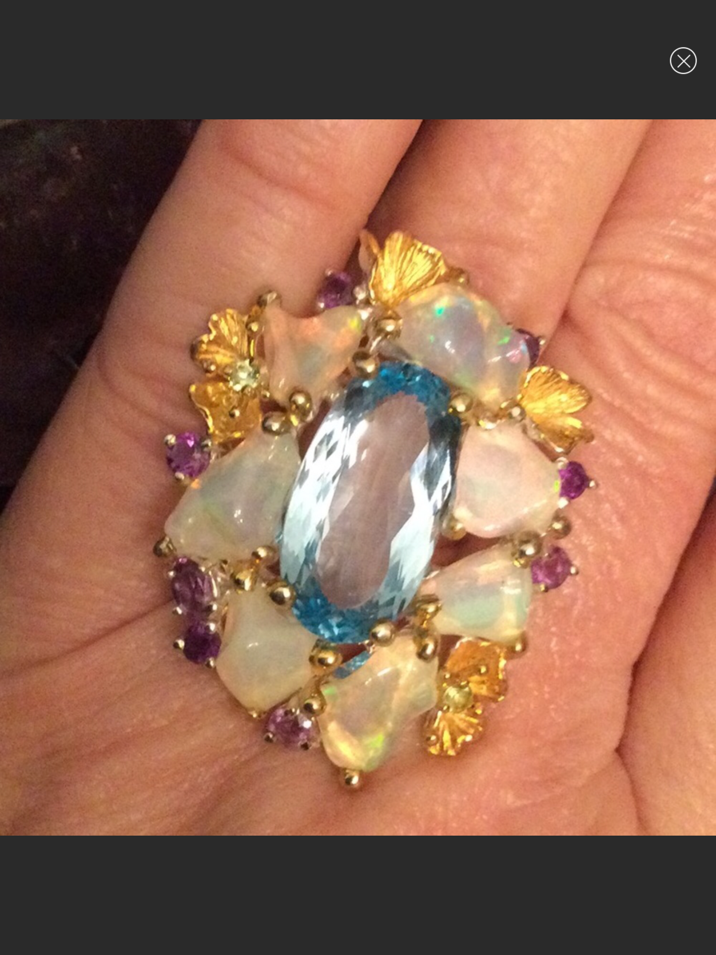 Over The Top Genuine Blue Topaz and Opal Ring