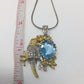 Artistic Genuine Blue Topaz Bird Pendant